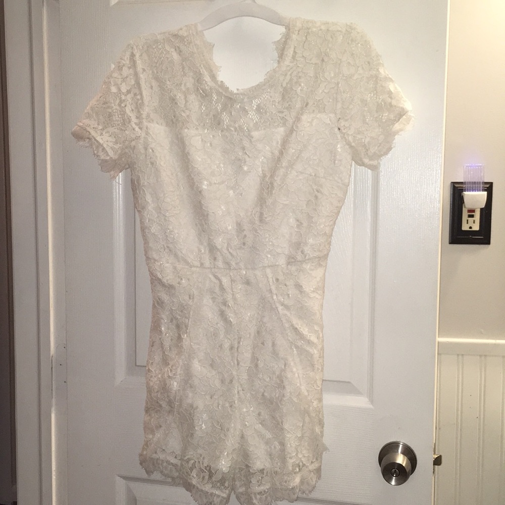 Never worn white Francesca’s romper